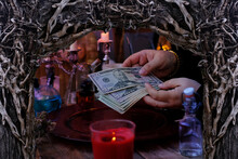 Seance In Salon Of Soothsayer, Female Hands Of Psychic Doing Witchcraft Passes With Money, Esoteric Oracle Performs Ritual Of Removing Spell Of Black Magic, Esoteric Business, Magic To Increase Income