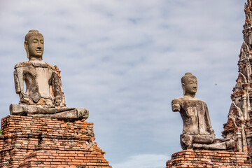 Wall Mural - The broken Buddha statue in Wat Chaiwatthanaram. A Buddhist temple in the city of Ayutthaya Historical Park, Thailand, on the west bank of the Chao Phraya River. was constructed in 1630 by the king. 