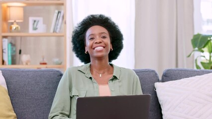 Poster - Happy, casual and beautiful female laughing at a joke while working on her social media blog post relaxing at home. Portrait of young, edgy and afro woman, blogger and freelancer typing on her laptop