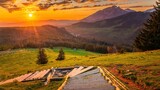 Fototapeta  - Wschód słońca nad Tatrami i Pieninami widziany z drogi na Gęsią Szyję w czerwcu