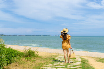 Wall Mural - Woman enjoy the sand beach