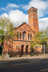 Abandoned and shut down historic red brick Belfast Methodist church building on University road, Belfast, Northern Ireland, UK