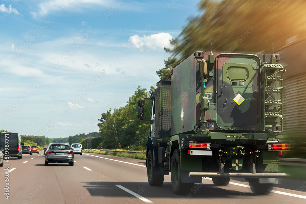 German armoured semi-trailer cargo truck carrier drives military convoy