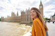 © zigres - Happy young female tourist visiting London sights, United Kingdom