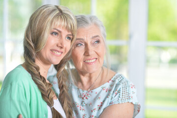 Sticker - Portrait of senior woman with daughter at home