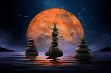 Wall Mural - stones in zen balance on a lake and the planet mars as a background