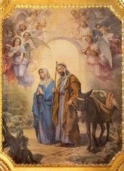 Wall Mural - VALENCIA, SPAIN - FEBRUAR 17, 2022: The painting of Flight to Egypt in the church Basilica Sagrado Corazon from year 1897.
