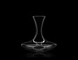 Empty decanter for wine isolated on black background