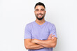 © luismolinero - Young Arab handsome man isolated on white background keeping the arms crossed in frontal position