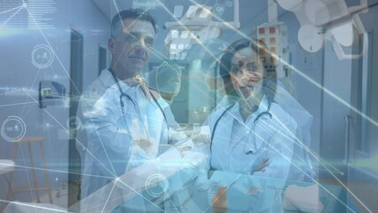 Canvas Print - Animation of connections over diverse doctors looking at camera