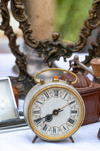 An Old Alarm Clock On A Flea Market In Italy.