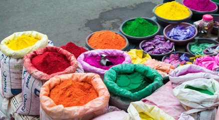 Colorful traditional holi powder on Indian street. Happy holi.