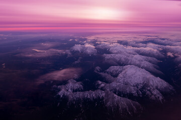 Wall Mural - aerial view of snowy mountains over washington state ,united states