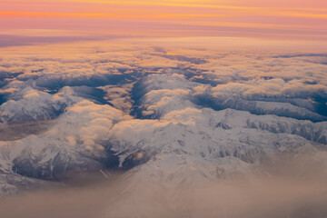 Wall Mural - aerial view of snowy mountains over washington state ,united states