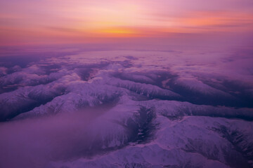 Wall Mural - aerial view of snowy mountains over washington state ,united states