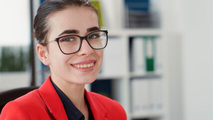 Poster - portrait of business woman working with financial charts to create sales report in startup office. m