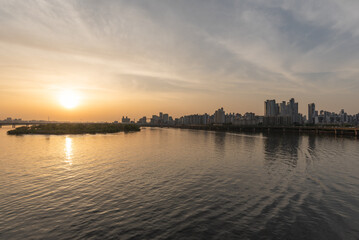 Wall Mural - Han river and Seoul cityscape sunset view in South Korea