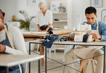 Fashion designer, young man and creative student in a workshop to stitch clothes. Factory worker, tailor and apprentice learning sewing machine skills in a textile startup and manufacturing studio