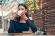 © C Haas/peopleimages.com - Calm, relaxed and stylish woman taking a coffee break at an outdoor coffee shop in summer. One young entrepreneur or freelancer enjoying her free time drinking tea and relaxing outside