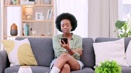 Aufkleber - Angry, unhappy and frustrated woman checking her phone and feeling annoyed, irritated and upset at home. Sulking, grumpy and impatient lady with an afro struggling with her internet connection