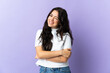 © luismolinero - Young caucasian woman isolated on purple background laughing