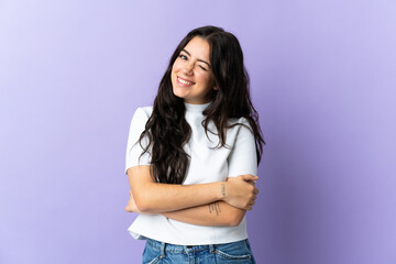 Wall Mural - Young caucasian woman isolated on purple background laughing