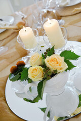 Wall Mural - Detail of a table set in ocher color organza for a wedding banquet