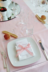 Wall Mural - Detail of a table set in pink for a wedding banquet