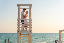 Love Guy Lifeguard Tower Pair Girl Paradise Sunrise Life Rescue, For Surf Tourism From Travel And Sky Save, Iconic Saver. Background Scenery Hut, Sunset