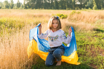 little girl in national ukrainian clothes - vyshyvanka. ukraine, child in nature