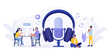 © Nadezhda Buravleva - People recording podcast in radio studio. Female radio host interviewing guest with microphone. Man and woman in headphones talking. Mass media broadcasting. People listening music in headset