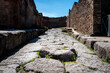 A crosswalk of a typical Roman road in the ancient city of Pompeii, Italy