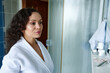 © Taras Grebinets - Close-up beauty portrait of a charming middle-aged, natural beauty woman, in white bathrobe at home bathroom interior