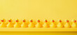 Banner yellow rubber duck background yellow ducks in a row. Rubber duck pattern yellow concept. Communication. Community. Rubber ducky bath toy duckling bathroom shelf toy design shelf decor. Organize