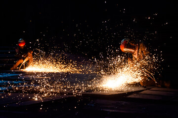 Wall Mural - Two unrecognizable welders at work