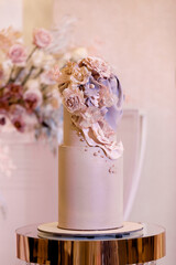 Wall Mural - Multilevel wedding cake decorated with pink flowers
