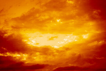 Wall Mural - dark red yellow orange sky with clouds. gloomy dramatic skies. background with space for design. sto