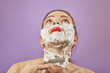 © tugolukof - woman shaves her face