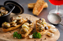 Mushrooms In Garlic Butter Sauce. Mushrooms Prepared With Garlic , Fresh Butter And Parsley Served As A Appetizer.