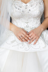 Wall Mural - Engagement ring on bride's finger during wedding preparations