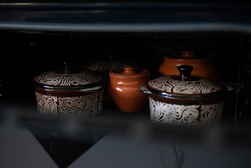 Clay pots in the oven. Cook, delicious recipe.