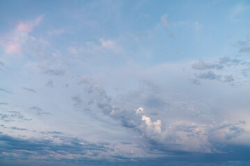 Wall Mural - beautiful high resolution sunset sky replacement background with a layer of low lying cumulus clouds
