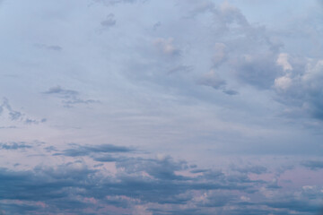 Wall Mural - beautiful high resolution sunset sky replacement background with a layer of low lying cumulus clouds