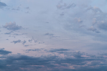 Wall Mural - beautiful high resolution sunset sky replacement background with a layer of low lying cumulus clouds
