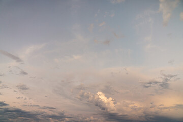 Wall Mural - beautiful cloudscape sky replacement background with layers of colorful white, yellow, orange and bl
