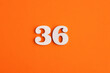 Number 36 - On orange foam rubber background