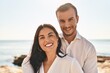 © Krakenimages.com - Man and woman couple smiling happy hugging each other standing at seaside