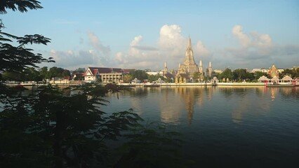 Wall Mural - Bangkok Beautiful City Scene, Chao Phraya River and Wat Arun Buddhist Temple Cityscape, a Famous Building in Southeast Asia with Amazing Light, Background with Copyspace