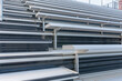 Close-Up of empty metal stadium bleacher seats along aisle with steps.
