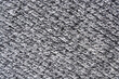 Seamless pattern of light grey knitting texture